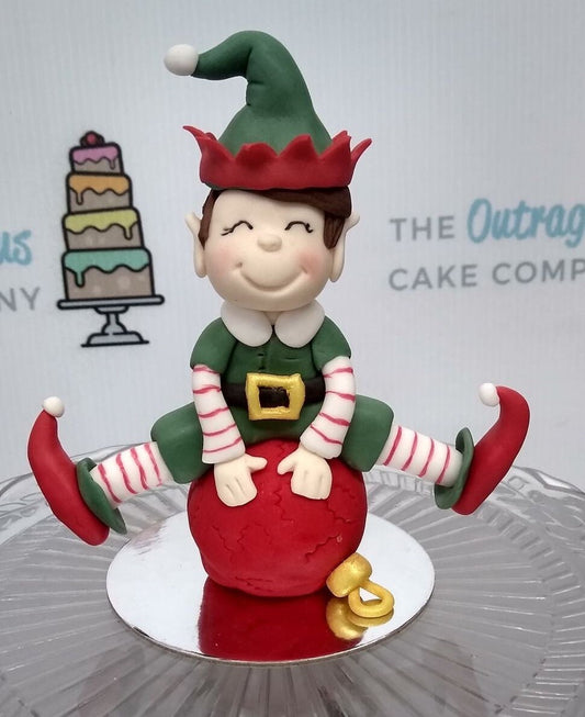 Sugar Christmas Elf on a bauble cake topper, Handmade sugar model, Ideal for Christmas cake or as a decoration