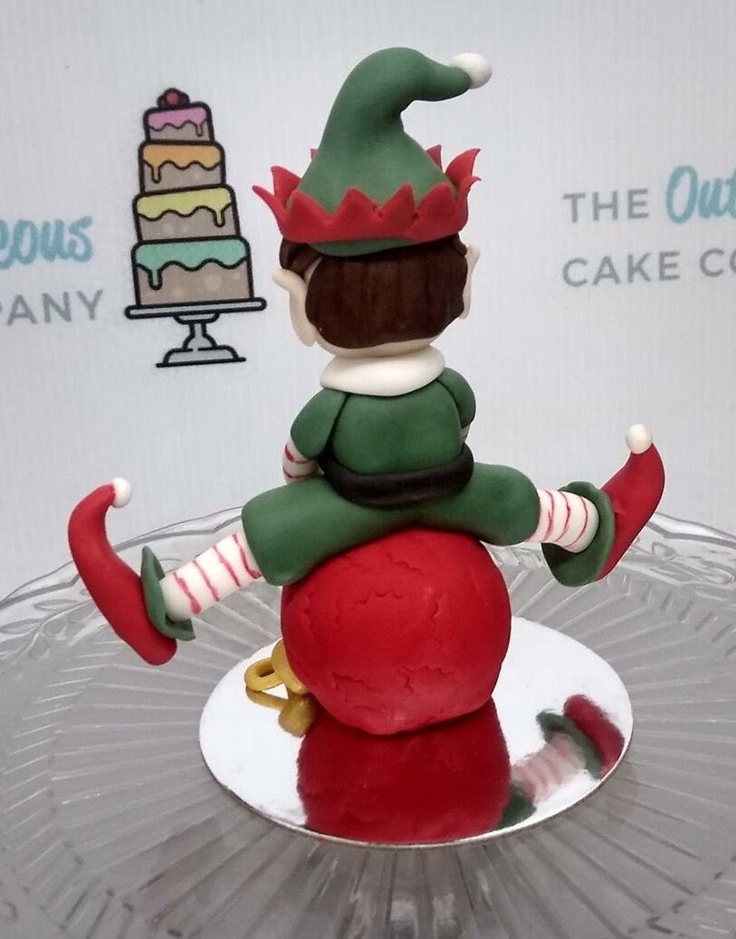 Sugar Christmas Elf on a bauble cake topper, Handmade sugar model, Ideal for Christmas cake or as a decoration
