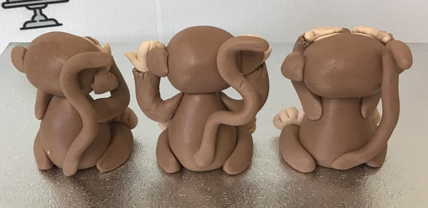 Fondant Three Wise Monkeys made with edible modeling paste, see no evil, hear no evil and speak no evil