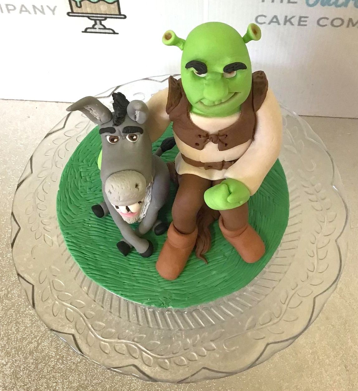 Handmade Shrek and donkey inspired sugar cake topper