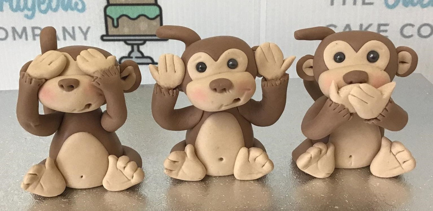 Fondant Three Wise Monkeys made with edible modeling paste, see no evil, hear no evil and speak no evil
