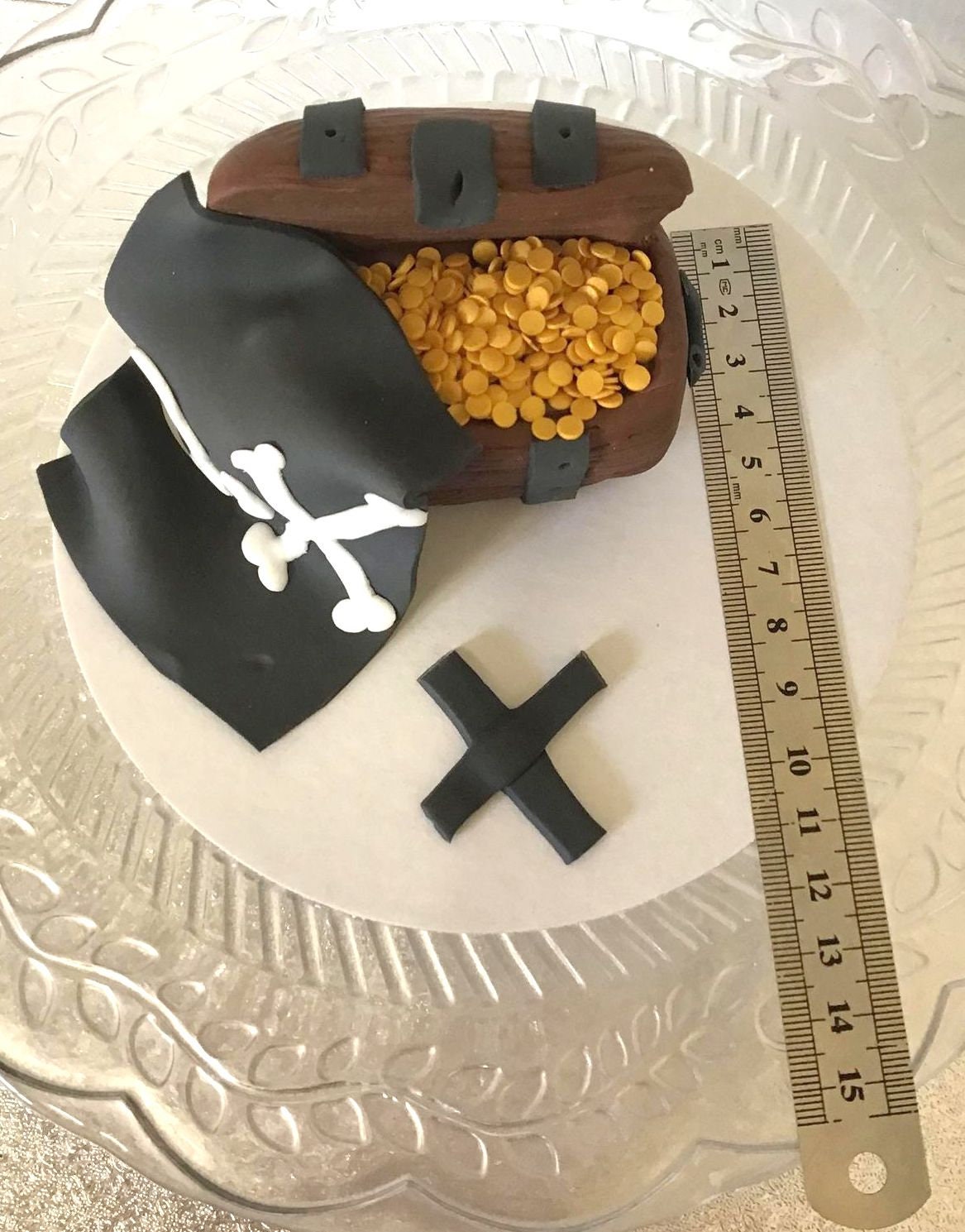 Handmade edible sugar Pirate treasure chest with Jolly roger flag and miniature gold coins