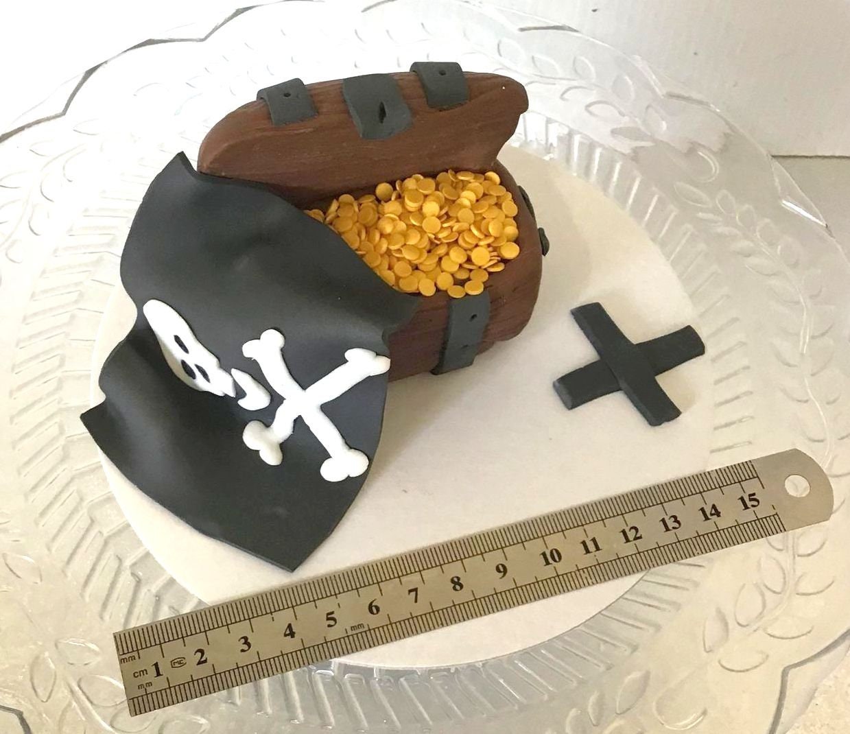 Handmade edible sugar Pirate treasure chest with Jolly roger flag and miniature gold coins